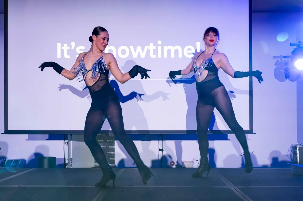 Two dancers opening a show in a hotel conference room