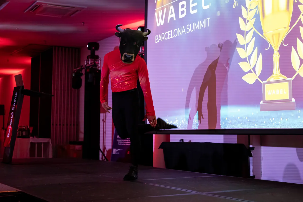 Themed character act with a masked performer on stage